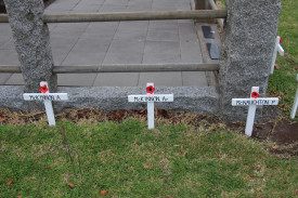 Poppy crosses lined the Mortlake.