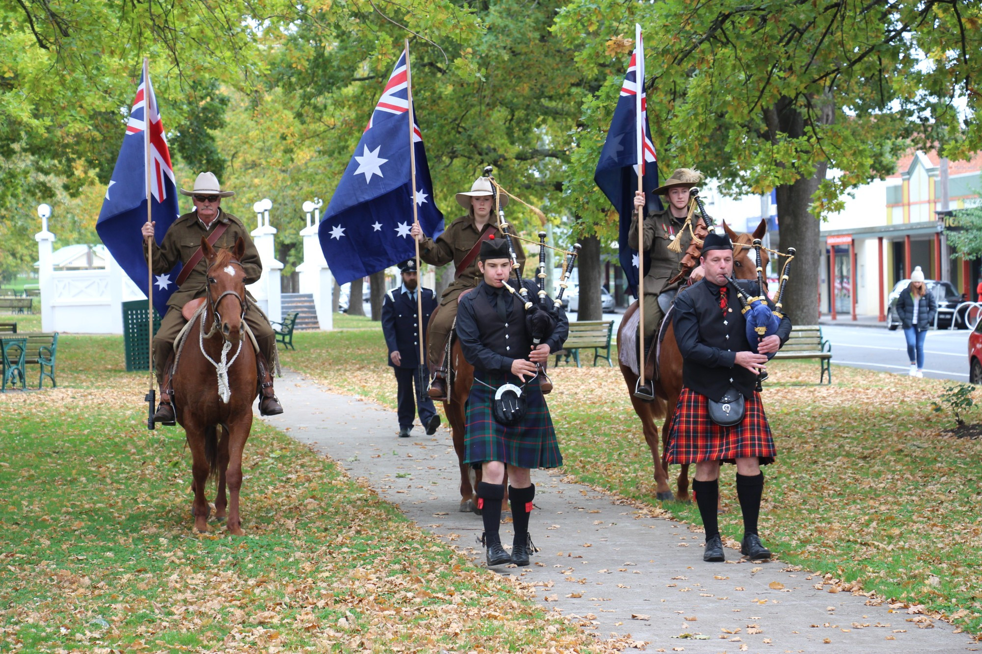 Lest We Forget: The procession makes it way down the Terang avenue as part of the town’s main Anzac Day service on Saturday.