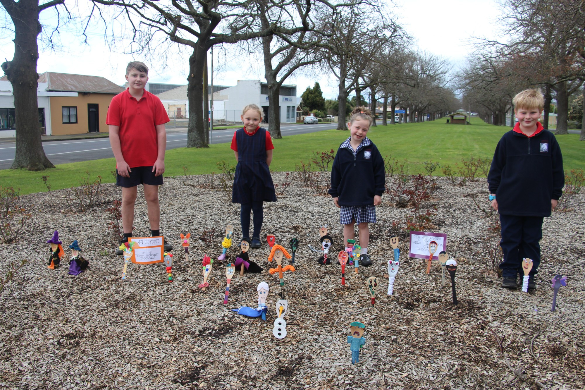 Creative flair: Terang College students Curtis Benallack, Ella Wilson, Ruby Ferrier and Riley McIntosh show of the Spoonville community they created for Terang’s High Street avenue.
