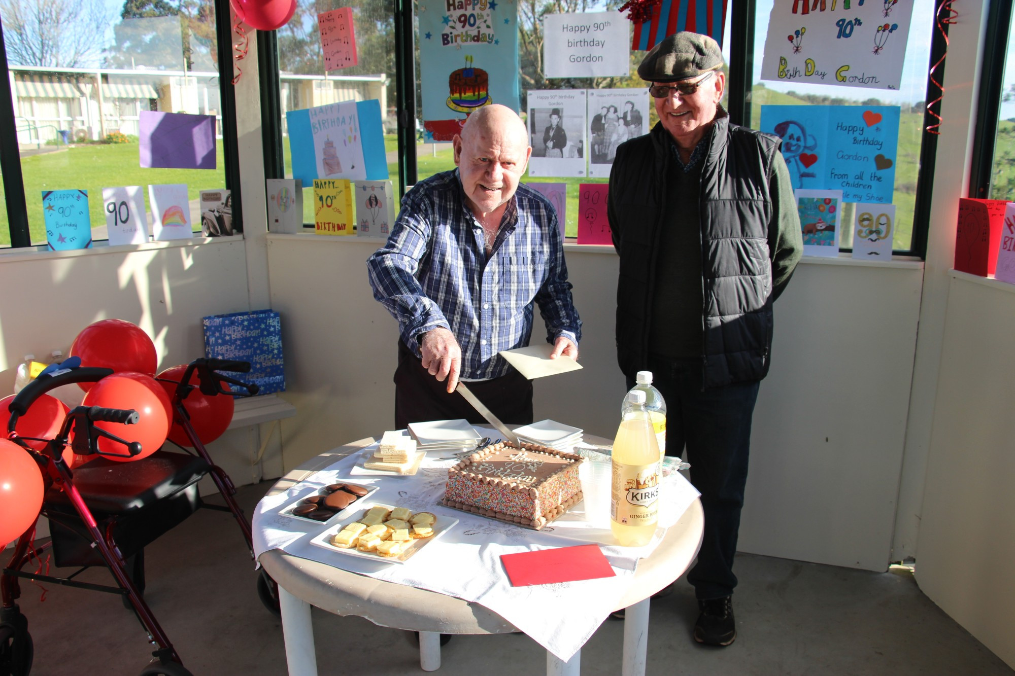 Special day: May Noonan Centre resident Gordon Selleck’s (left) 90th birthday celebration was made much more special thanks to the help of friend Tommy Heffernan and the local community.