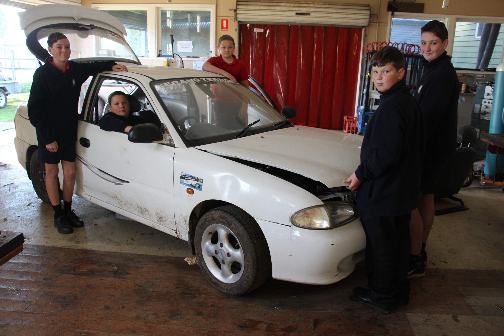 Hopeful: Members of Terang College’s Terang Terrors Car Race crew are hoping to return to competition in the near future.
