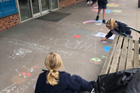 Sharing is caring: Students worked together to create the artwork which covered multiple locations along the block. 