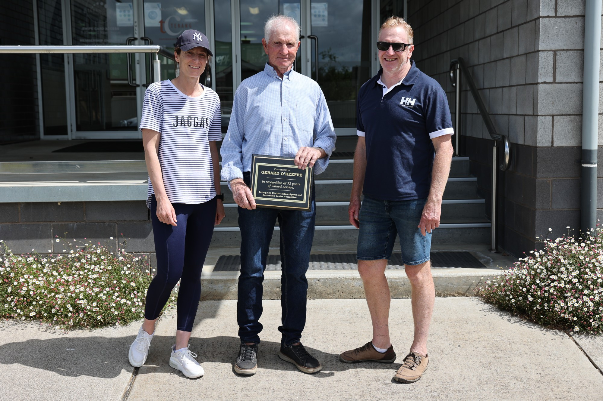 Respected: Terang Fitness manager Kelly Mullen (from left) joins Gerard O’Keeffe in recognition of his decades of service with fellow committee member Kerrin McKenzie.
