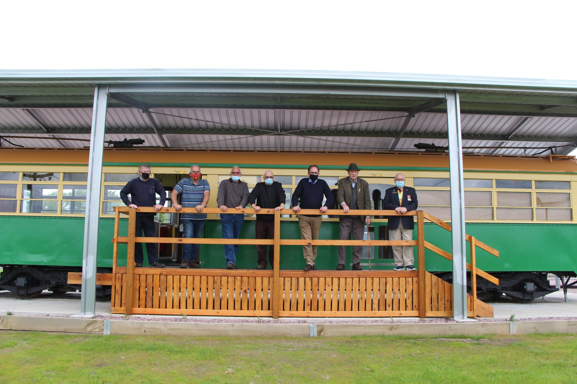 All aboard: Bruce Moore (from left), Gary MacKenzie, Terang RSL vice president Terry Fidge, Don Bowden, Polwarth MP Richard Riordan, WWII veteran Len Pomeroy and Terang RSL president Steve Bloxham enjoy the upgrades to the Terang RSL tram project.
