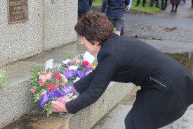 Corangamite Shire councillor Geraldine Conheady laying a wreath at the war memorial.