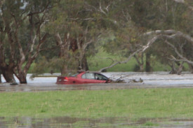 A local man has had a lucky escape after flood waters washed his car 80 metres from the road last week.