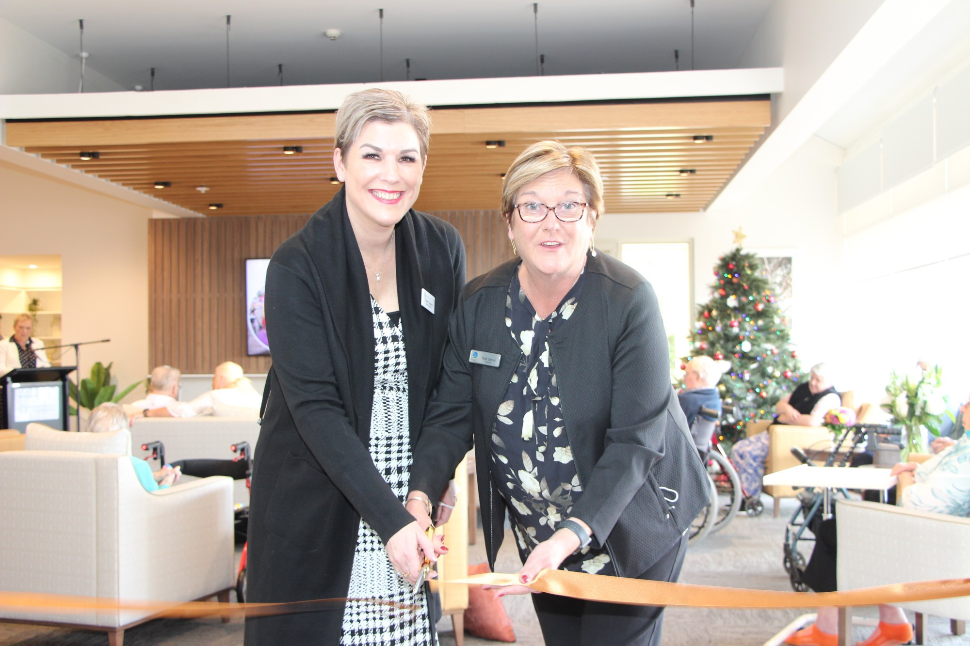 Home: Lyndoch Living board president Susan Cassidy and Corangamite Shire mayor Ruth Gstrein cut the ribbon at the official relaunch of the May Noonan Centre this week, which included plans for further renovations under the Lyndoch Living masterplan.