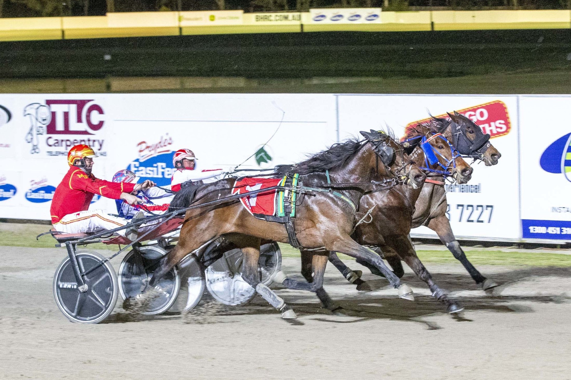 Mighty effort: Pink Galahs and Matthew Craven (red silks) won a fifth group one last Saturday night, with the pair chasing down Majestuso in the home straight to win the Bill Collins Sprint for a second consecutive year. Picture supplied by Stuart McCormick/Racing Photos