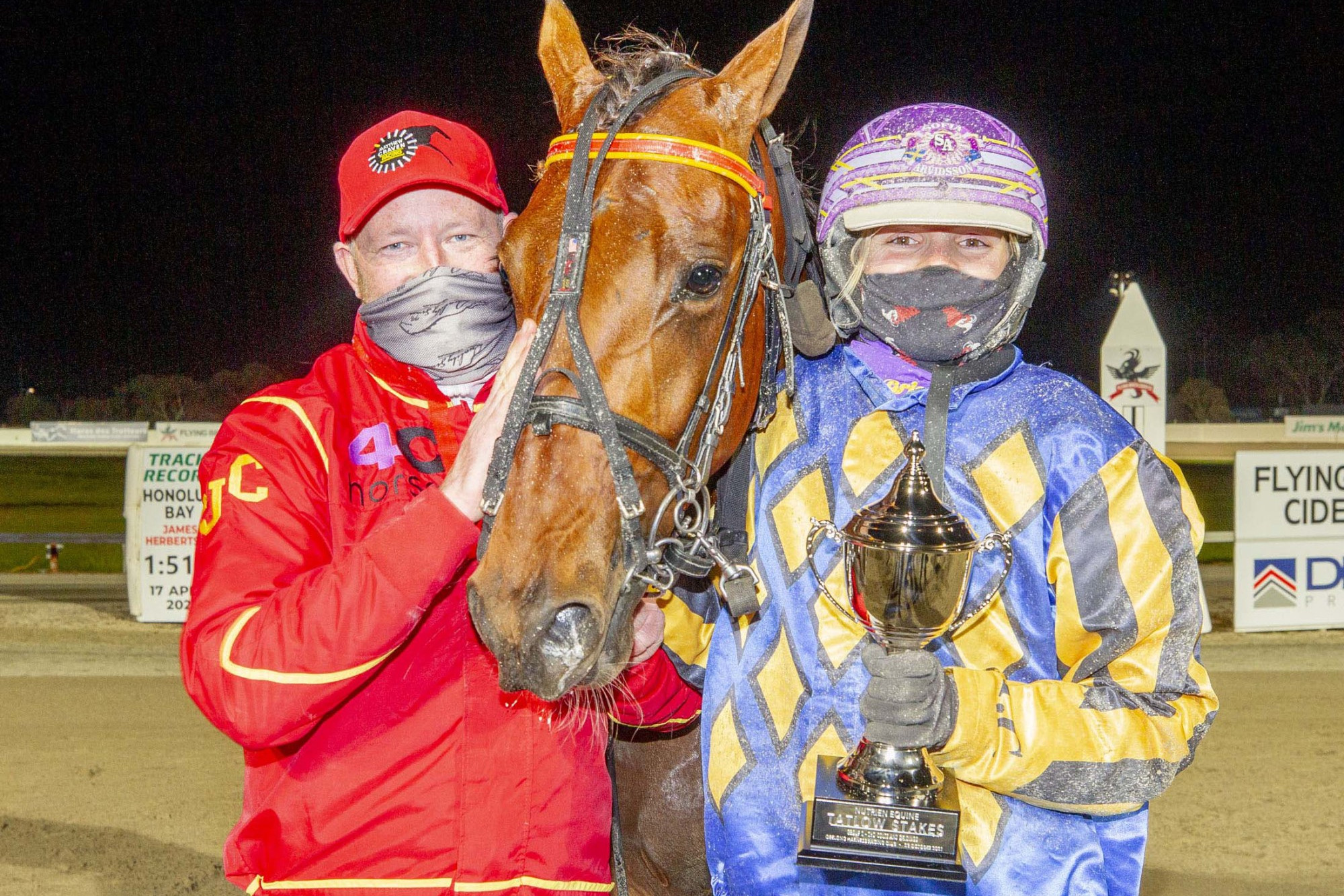 Winner: Matthew Craven (left) and Sofia Arvidsson celebrate Heza Son Of Agun’s win in the group two Tatlow Stakes on Saturday night. Picture suppliedby Stuart McCormick/Harness Racing Victoria