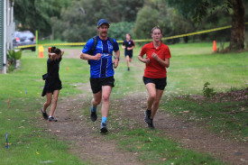 Girls’ 12/13 year secondary champion Emma Hill keeps pace with teacher Scott Twycross. 