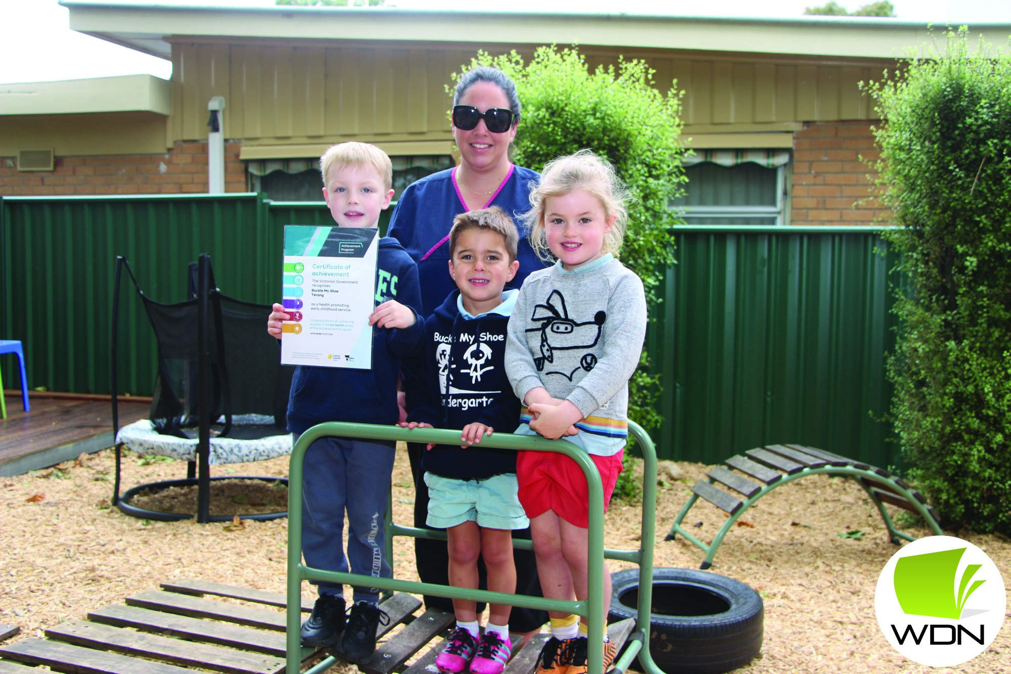 Recognition earned: Buckle My Shoe’s Lily Convery-Oborne (back) joined Liam Moloney (front) Knox Dale and Aila Nesser in celebrating the centre’s changes to create a healthier environment.