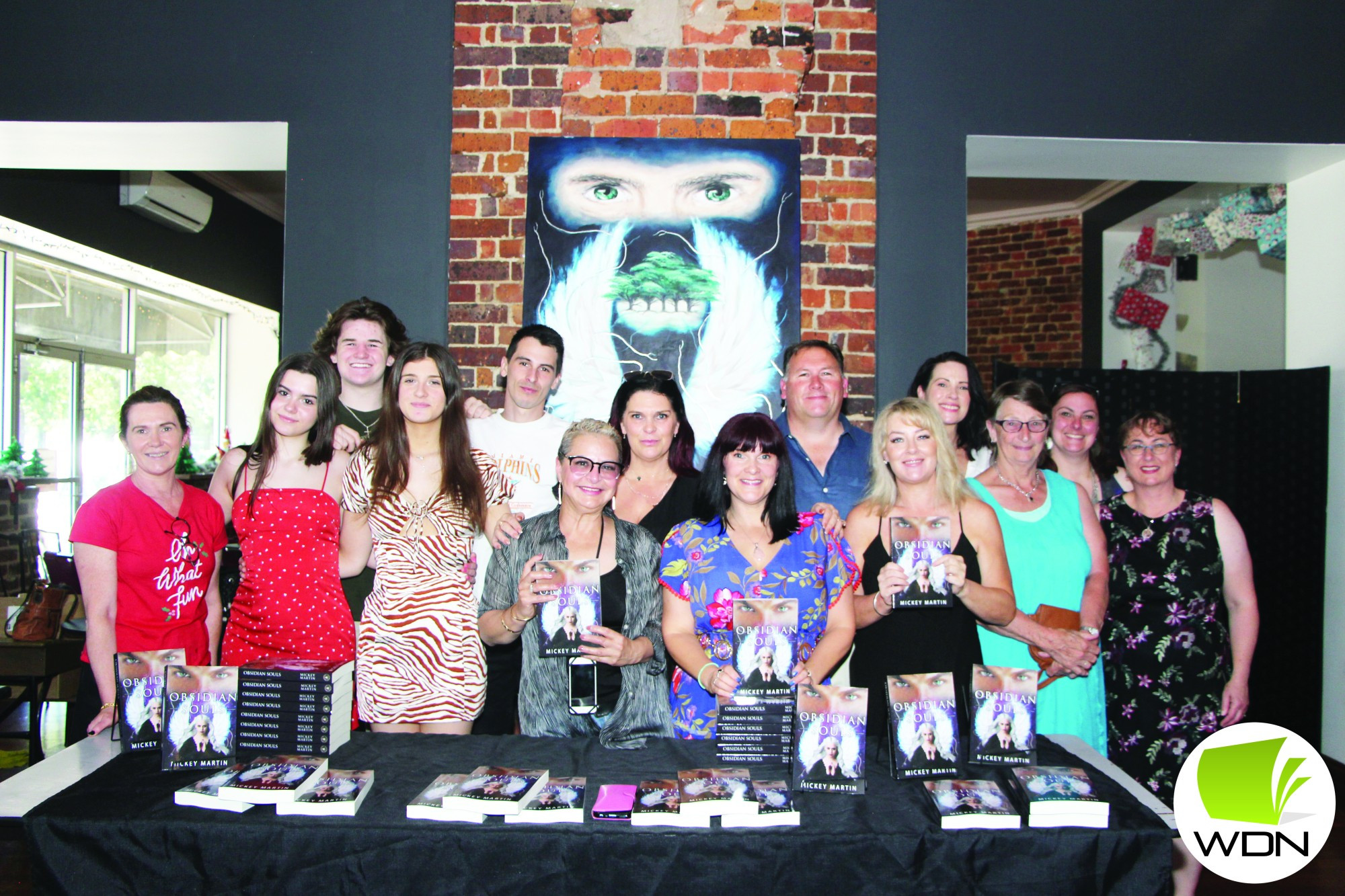 Putting Noorat on the map: (Seventh from right) Author Mickey Martin released her latest novel, Obsidian Souls, in Terang over the weekend. The novel is the second in her Victorian Collection, and is set in Noorat.