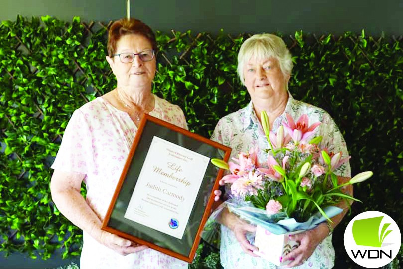 Newly appointed life member Judy Carmody (left) with fellow life member, Thelma Green.