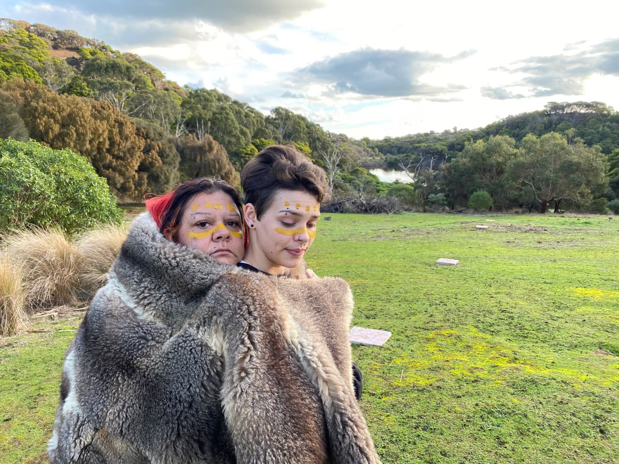 United: TMHS health promotion officer Steven Park and Kirrae Wurrung artist Naomi ‘Rose’ Litster pictured with one of the paintings on display, which TMHS has purchased.