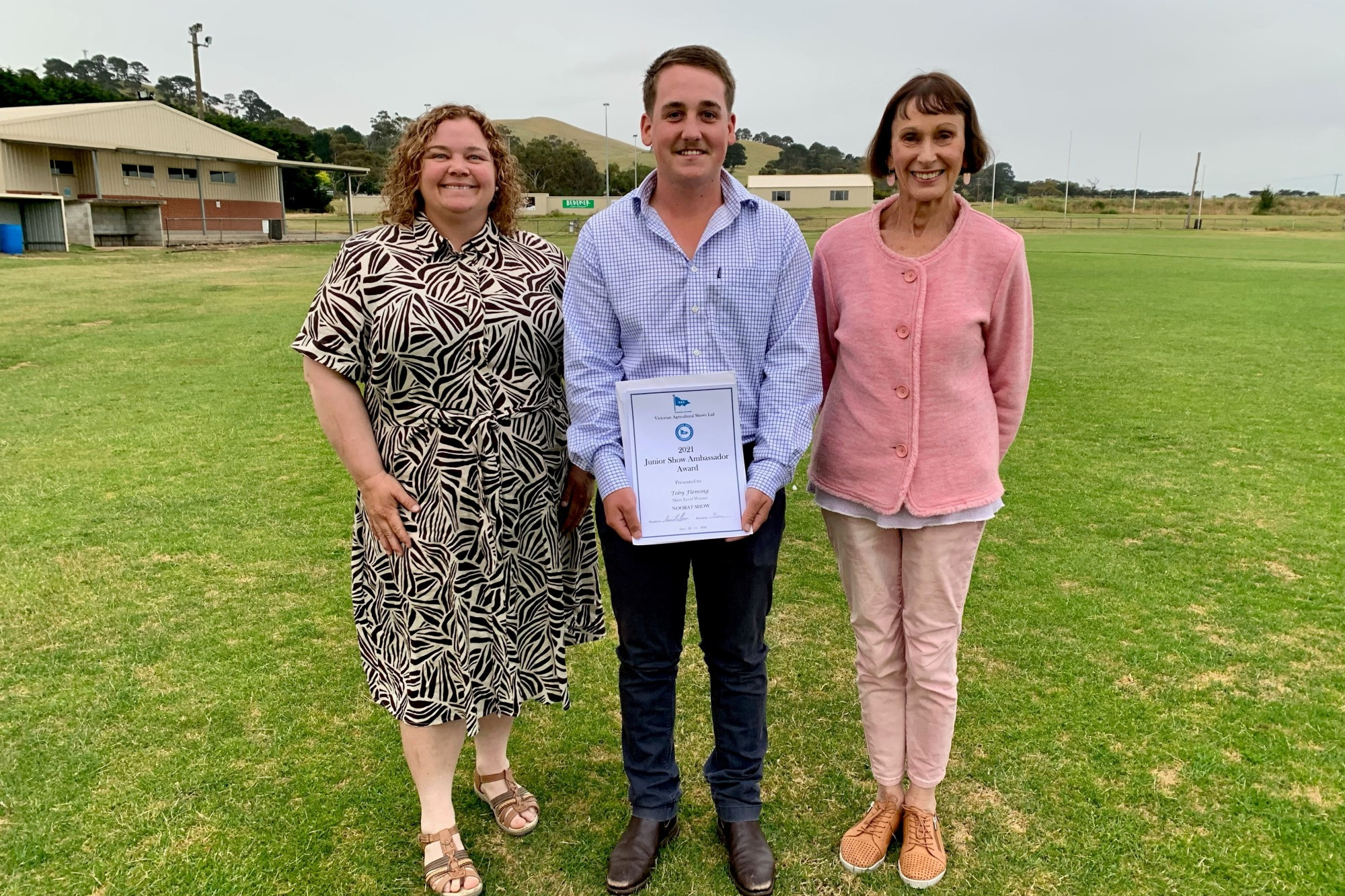 Best in state: Noorat Show president Monica Heffernan (left) and awards co-ordinator Eve Black presented Toby Fleming with the junior show ambassador award in 2021, from which he has since gone on to achieve state recognition.