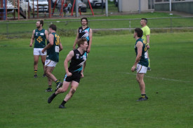 Tyler Beasley turns to celebrate his running goal. 