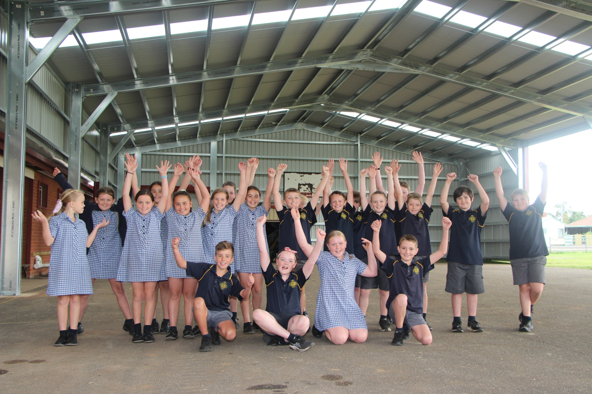 Out of the elements: St Colman’s Primary School students returned from the Easter holidays to find a new undercover structure over the school basketball court.
