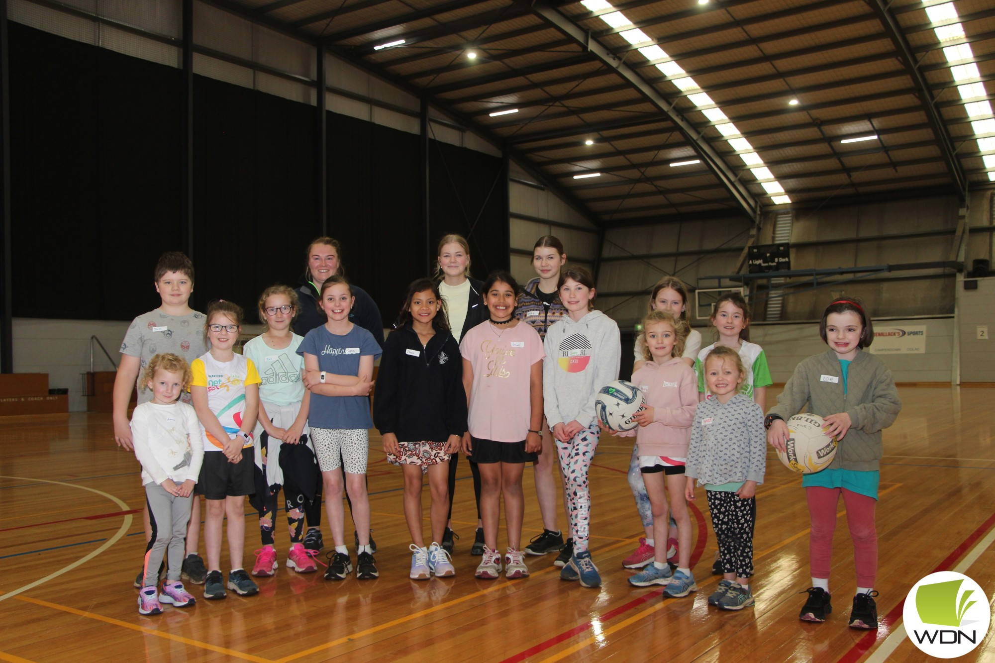 Better together: Mercy Regional College students Cali Howells and Ruby Atkins successfully hosted a netball session for kids of all abilities last week.