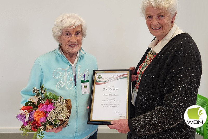 Congratulations: Mortlake CWA Day Branch member Jean Edwards (left) was recently recognised for 40 years of service. She is pictured receiving a certificate of recognition from CWA South Western Group president Bev Byron.