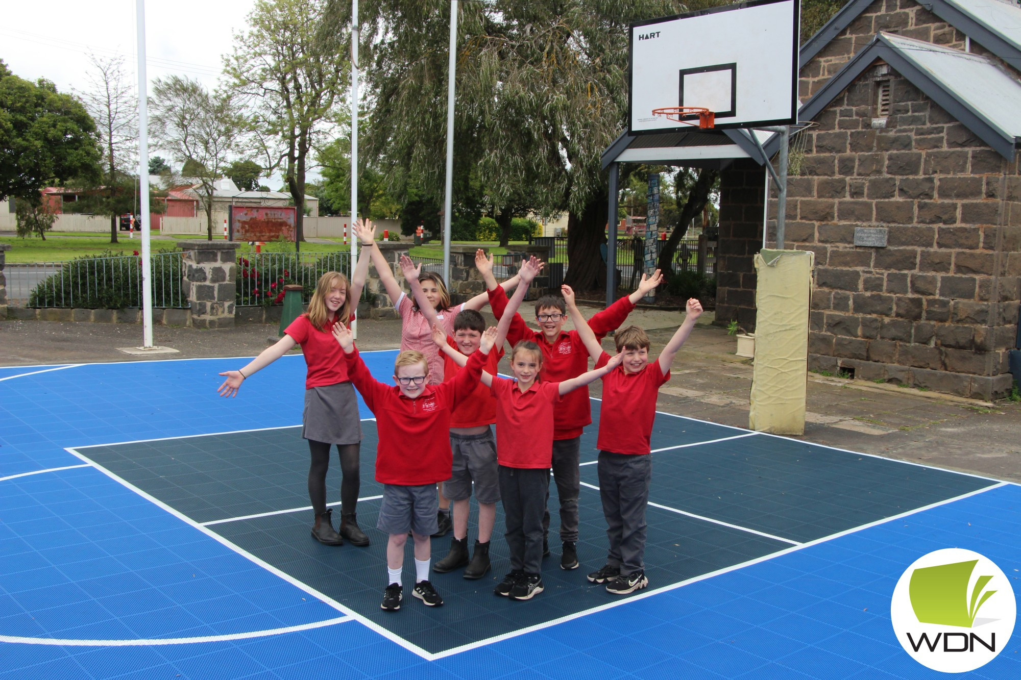 Pick and roll: Noorat Primary School students were overjoyed with the installation of new non-slip basketball court, made from 100 per cent recycled materials, last week.