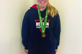 Tayla Bell with her bronze medal. 