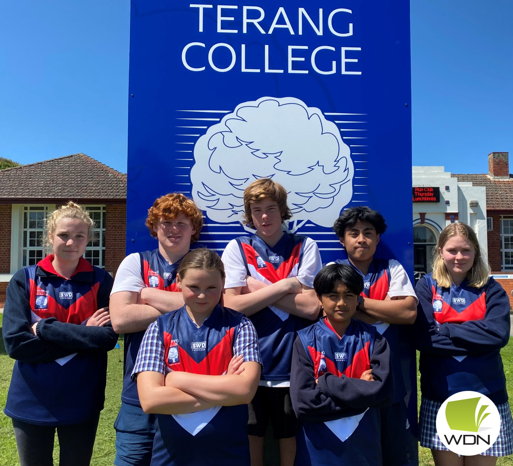 Terang College students Ned Roberts and Jess Bell with Terang Op Shop volunteers Margaret Parnell and Sandra Adams.