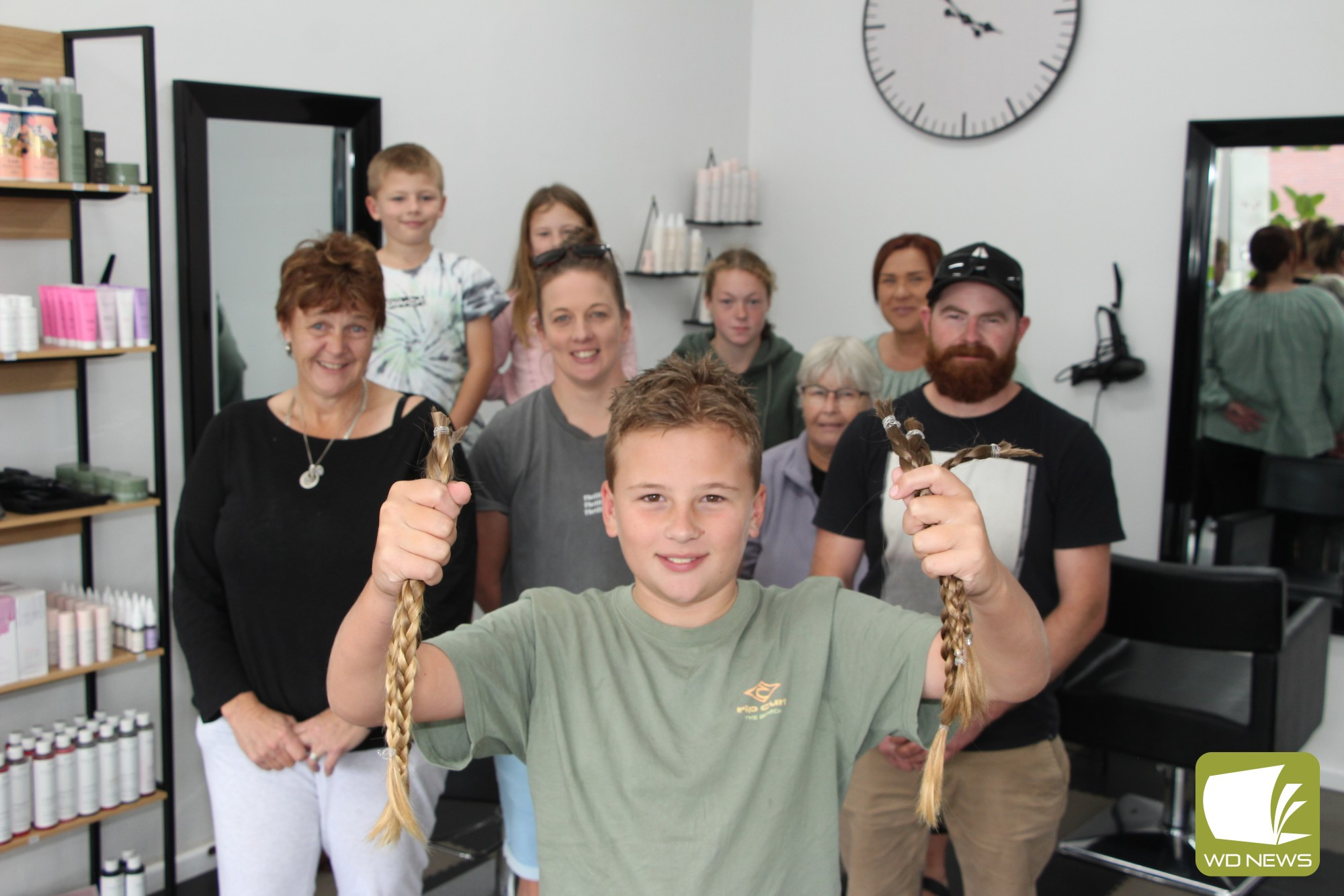 Legend: Terang’s Jaxson Church has chopped off his signature long hair to support children’s health initiative Wigs for Kids. As part of the cut, he also raised more than $2000 in support of local mental health initiative Surviving the Dark Times.