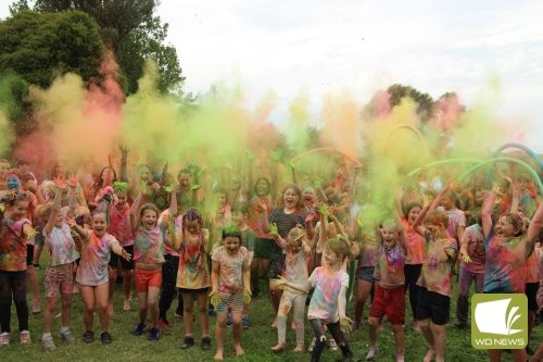 For each other: Terang College and Hampden Special School students ran a gauntlet of colour last week in support of a unified, inclusive education system.