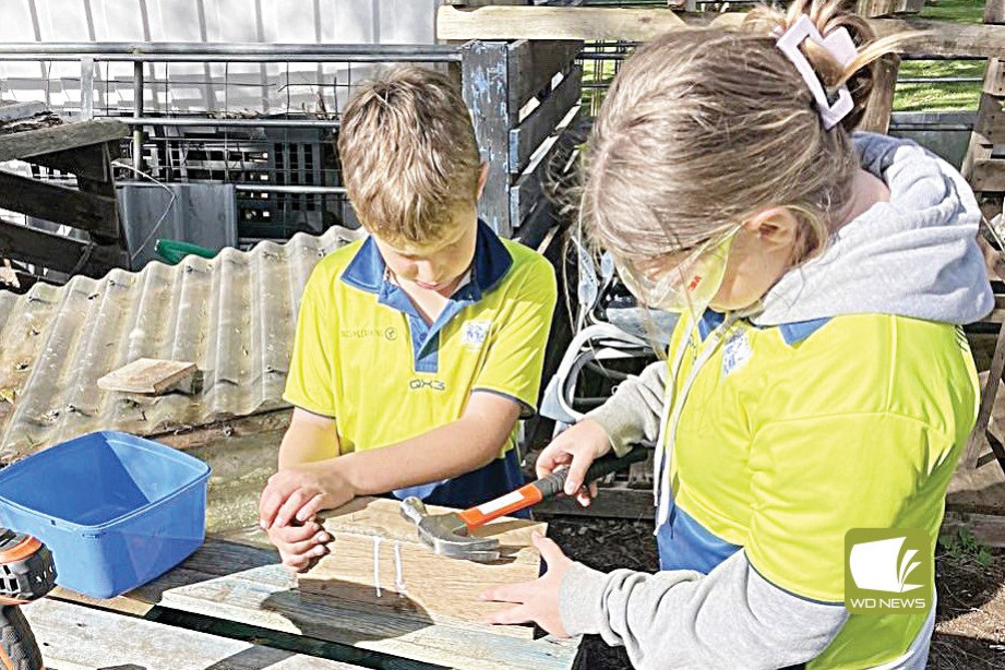 At work: Students used recycled materials to construct their project.