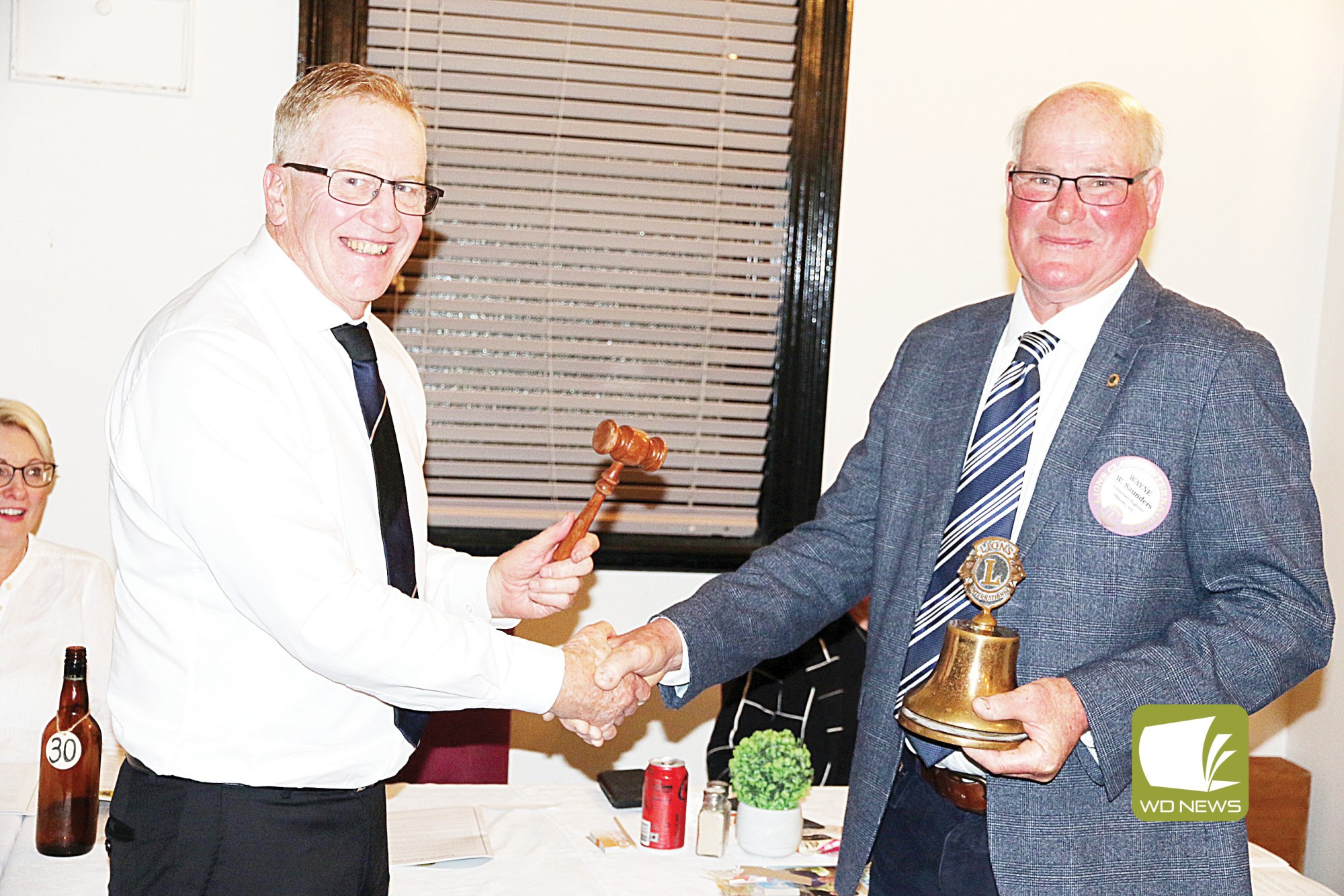 Best wishes: Outgoing Terang and District Lions Club president Kerrin McKenzie (left) welcomed new president Wayne Saunders to the role at the club's recent changeover dinner.