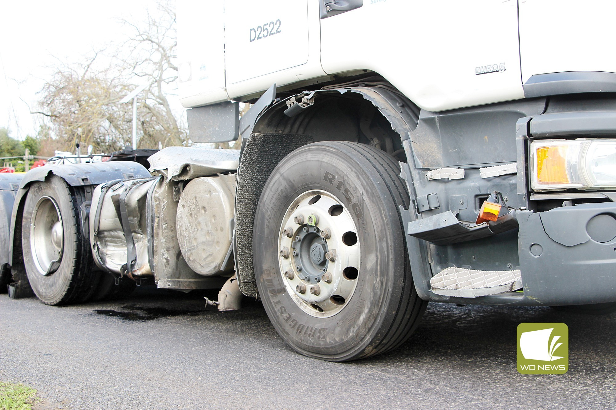 Caution urged: A truck’s fuel tank sustained significant damage as a result of the crash on Monday morning.