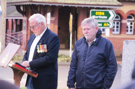 They shall not grow old: Terang Returned and Services League sub-branch members Terry Fidge and Bruce Moore reflect during a minute of silence. 