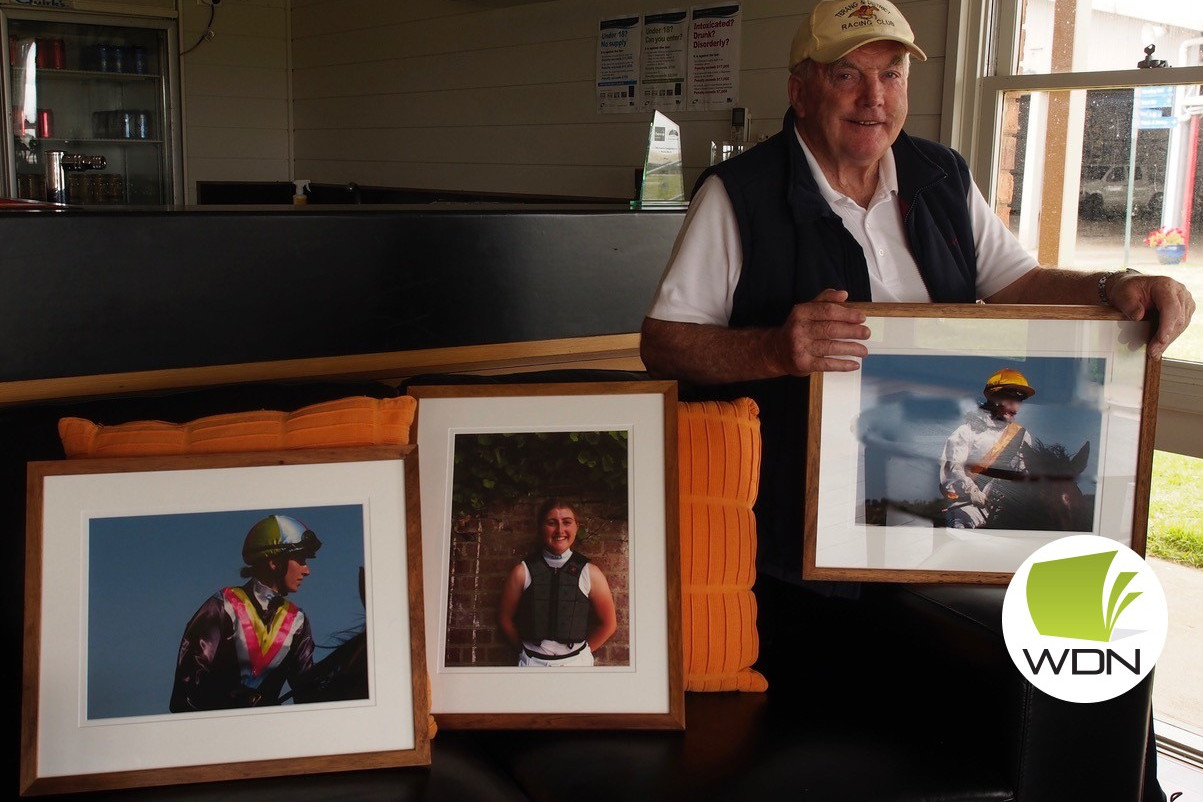 Des McKinnon with photographs Christina de Water shot at the Terang Racing Club, which were ordered to celebrate the growing role women play in country racing.