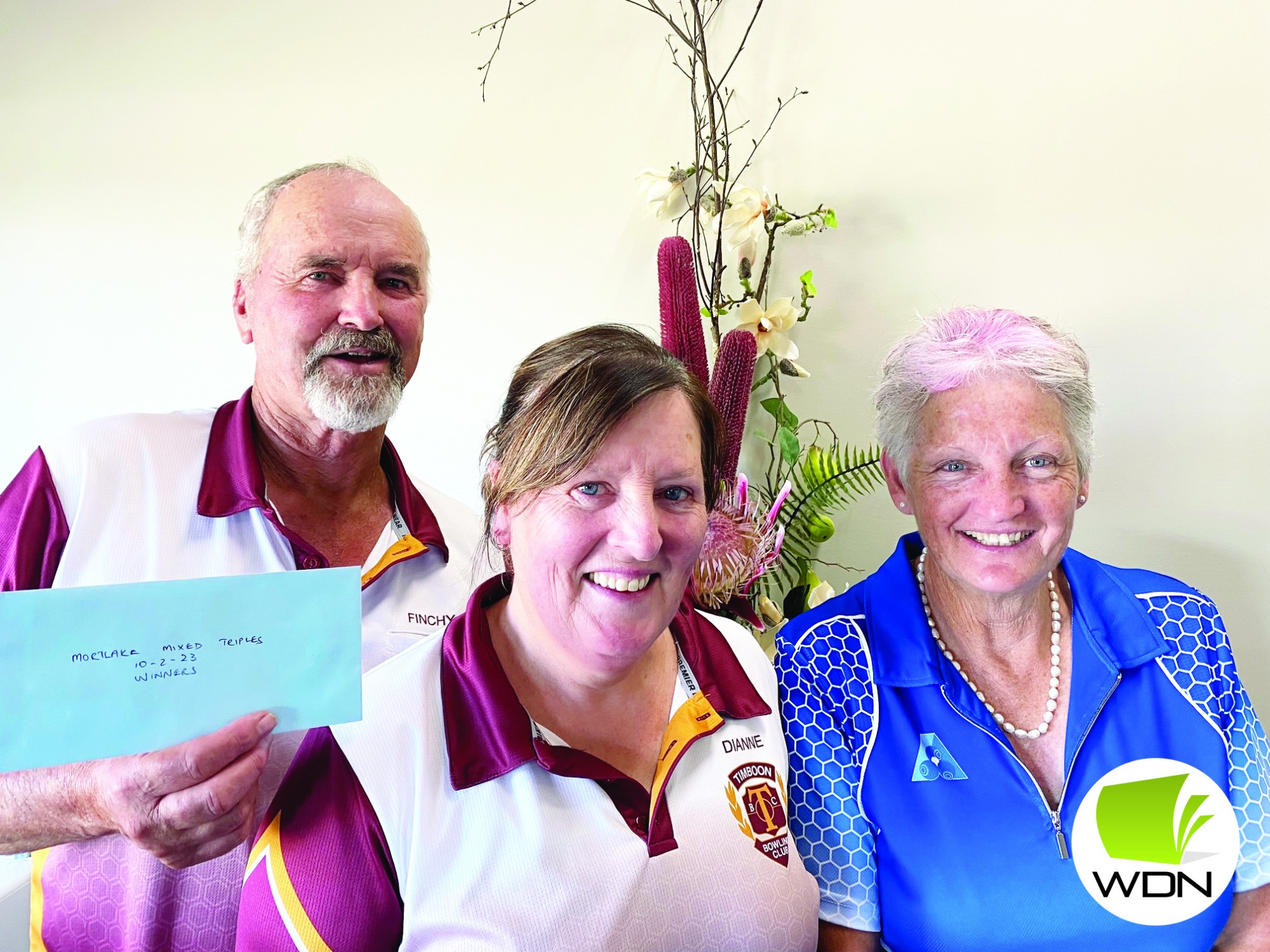 Mixed triples runners-up George Draffen, Sandi McAlion and Greg Collins.