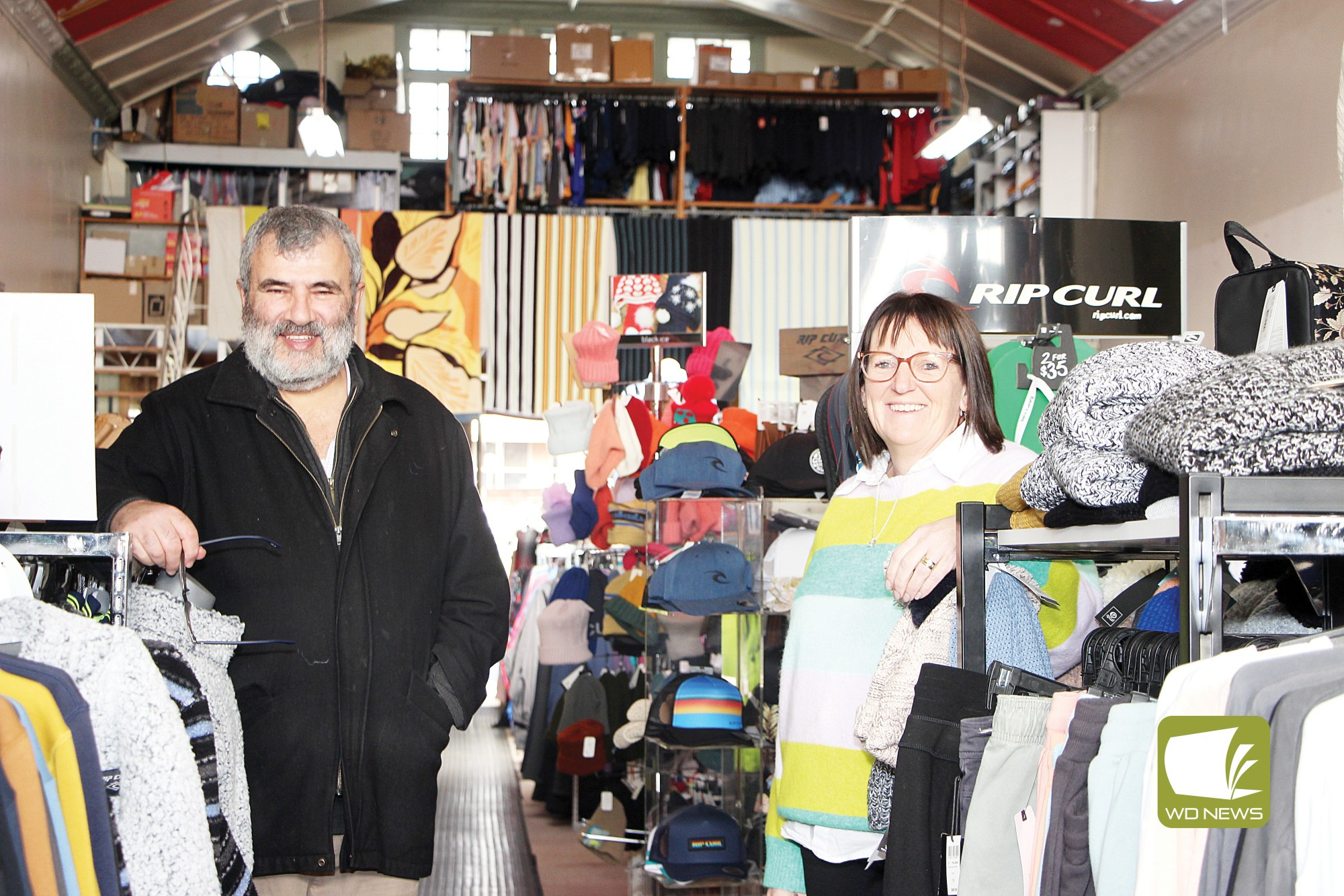 Milestone: A little business which started out of the back of an old green panel van by Lebanese emigrant Les Reicha will celebrate its 70th birthday this month. Pictured is Reicha’s Drapery owner Michael Reicha and colleague Sharon Kenna.