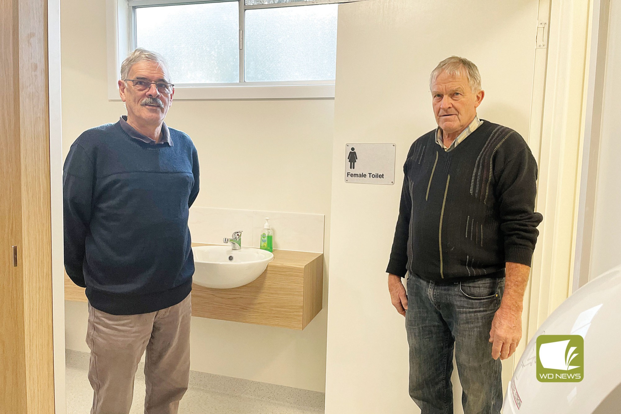 Major renovations: Scotts and Cowleys Creek Hall president Peter Baker and treasurer Neville Robb hope the newly installed toilets will lead to increased use of the space.