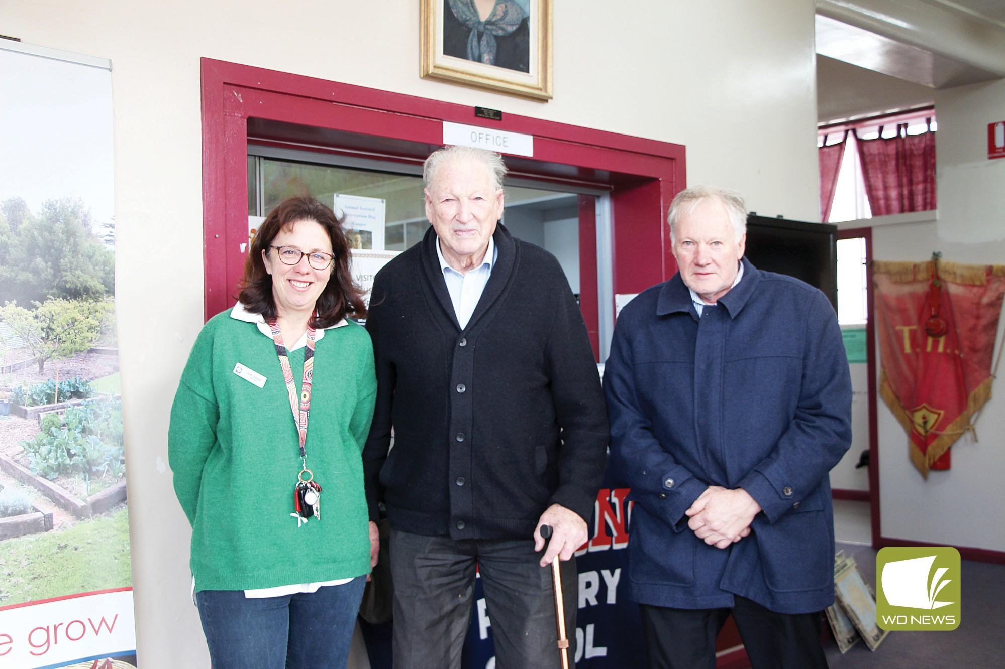 Saying goodbye: The Terang College and Hampden Specialist School junior campus was farewlled as students prepare to move to the Strong Street campus when a $15 million redevelopment project is completed next term. Pictured is Terang College principal Kath Tanner with centenarian Len Pomeroy and his son Chris, both of whom were students at Terang College’s junior campus, during a farewell walkthrough on Sunday.