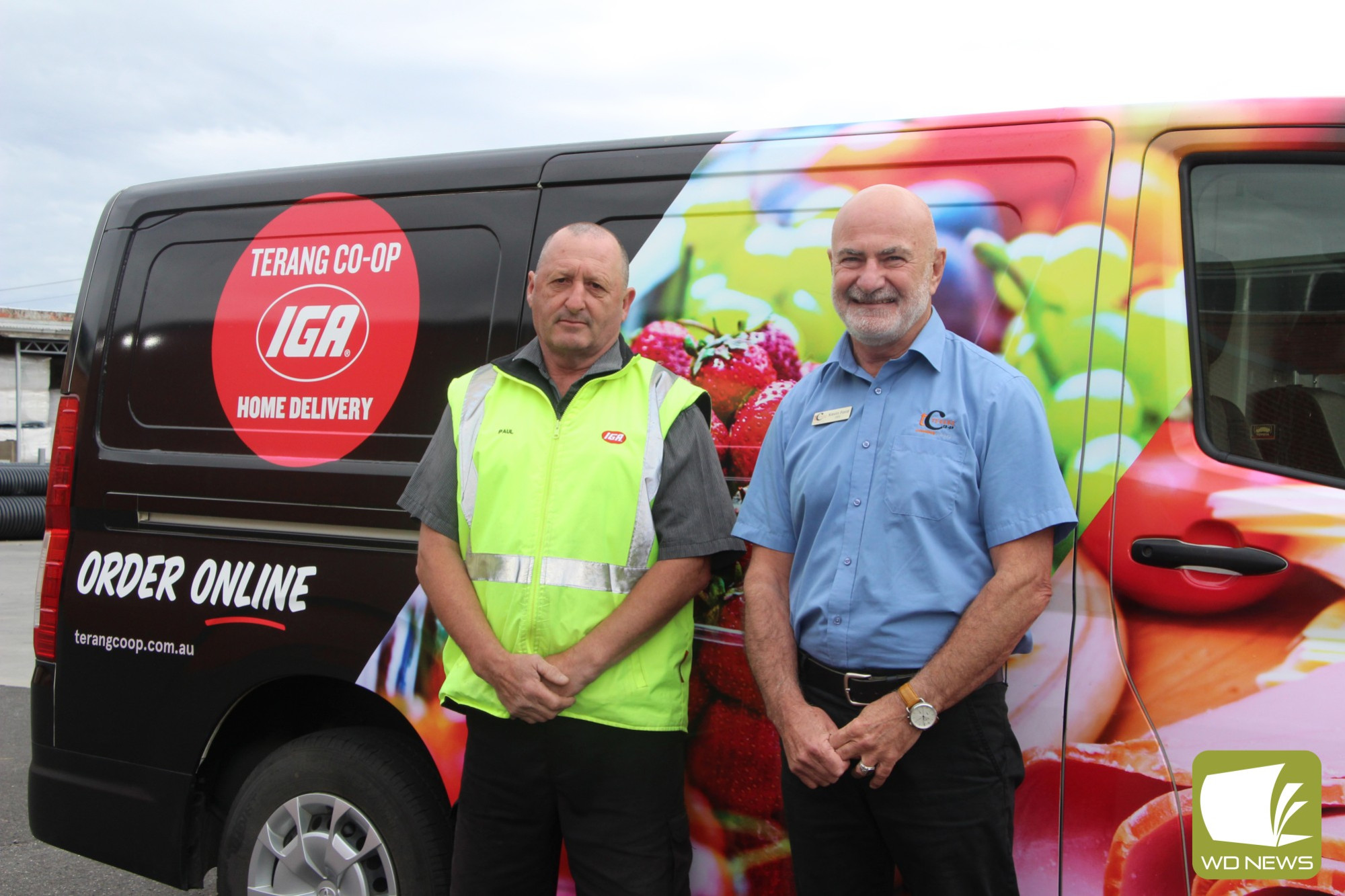 Order up: Terang and District IGA Co-Op chief executive officer Kevin Ford has announced an expansion to the popular order and home delivery services, with some changes coming in to effect from this week. Mr Ford (right) is pictured with Paul Hay, who received recognition earlier this year for his role in the service.