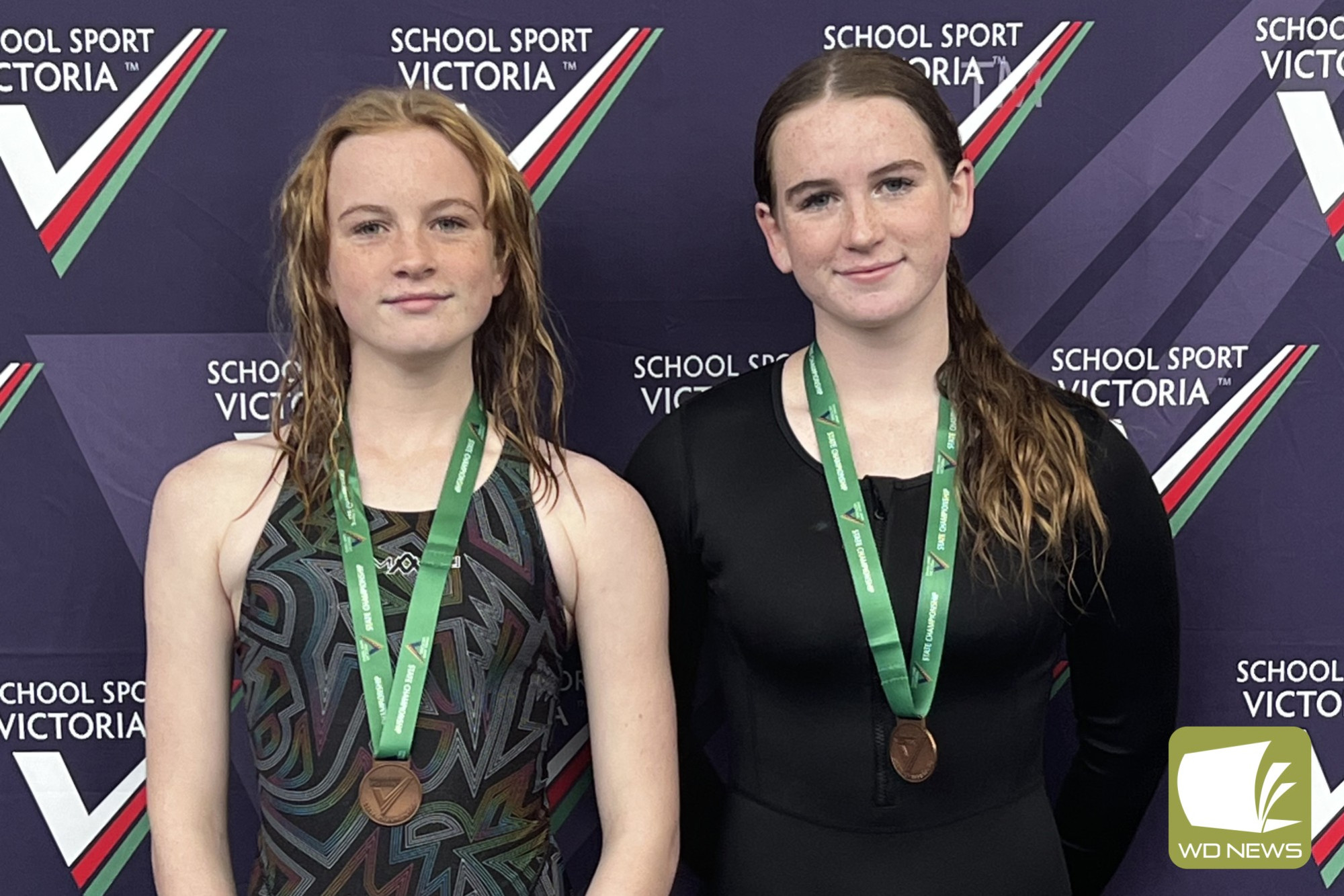 Terang College students Jackenzie and Lynley Sharp with their swimming medals.