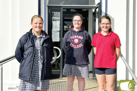Terang College middle school captains Maddi Wallace (left) and Tahnee Sachs (right) join school captain Gemma Blain. 