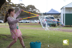 All smiles: Bubbles and face painting received a tick of approval from the youngest racegoers.