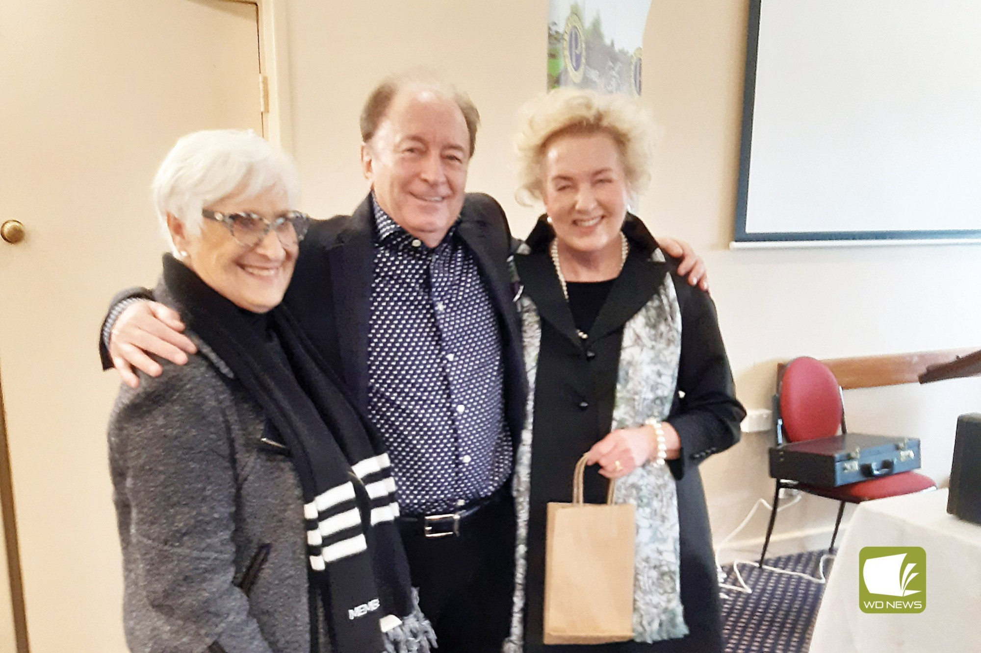 Welcome to Terang: Judy Blackburn with Paul and Angela Riggs.