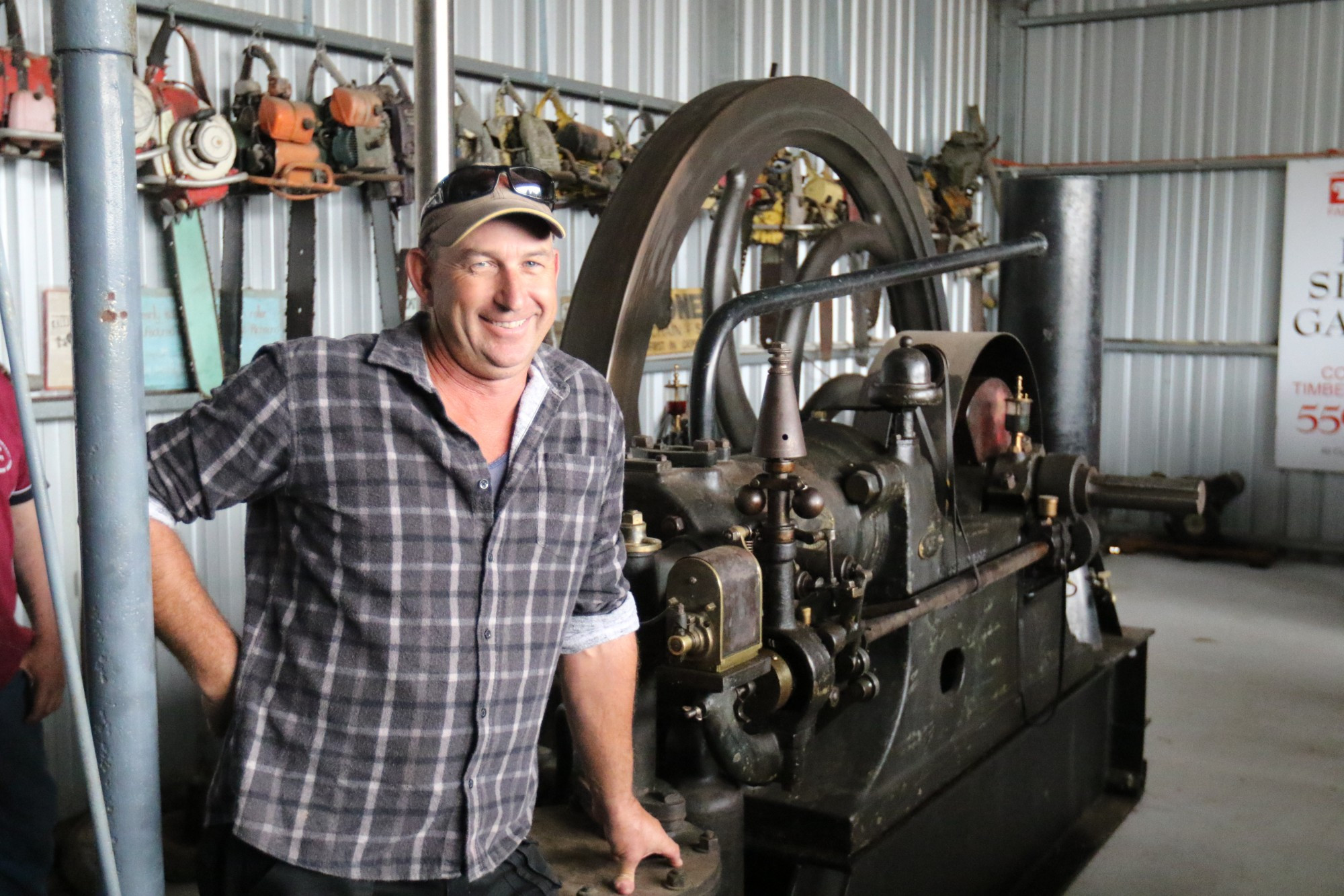 Heritage on show: Steffan Close, who’s dad owned the former Dalvui Homestead Crossley engine, started the historic engine before a large crowd at the South Western District Restoration Rally on Saturday.