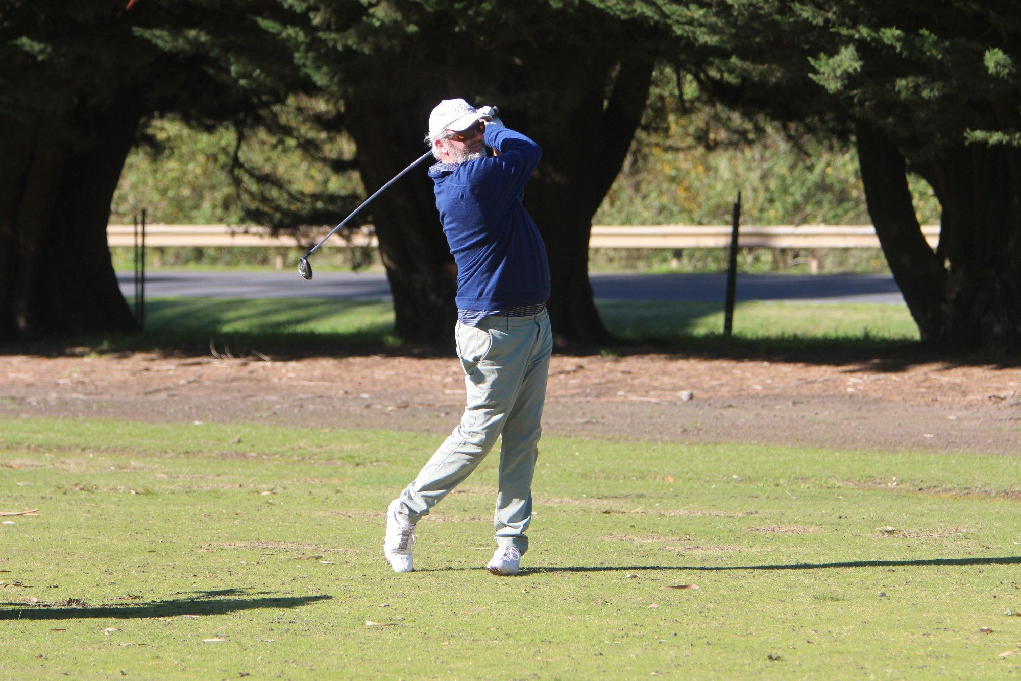 Martin Darcy tracks his second shot on the third fairway.