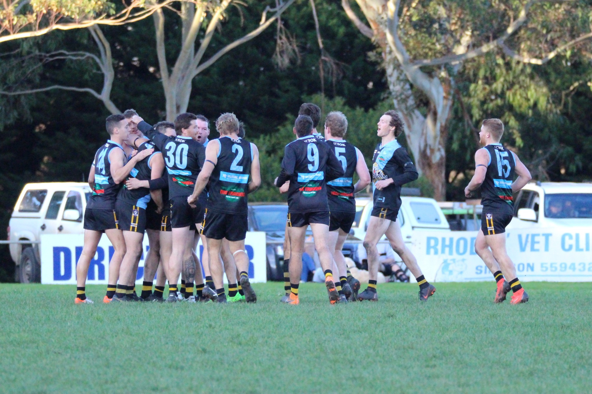 Training return: Simpson Football Netball Club’s senior football side, celebrating a goal against Alvie last season, was set to resume training last night following AFL Victoria’s approval for club sanctioned training sessions to be held as of Monday.