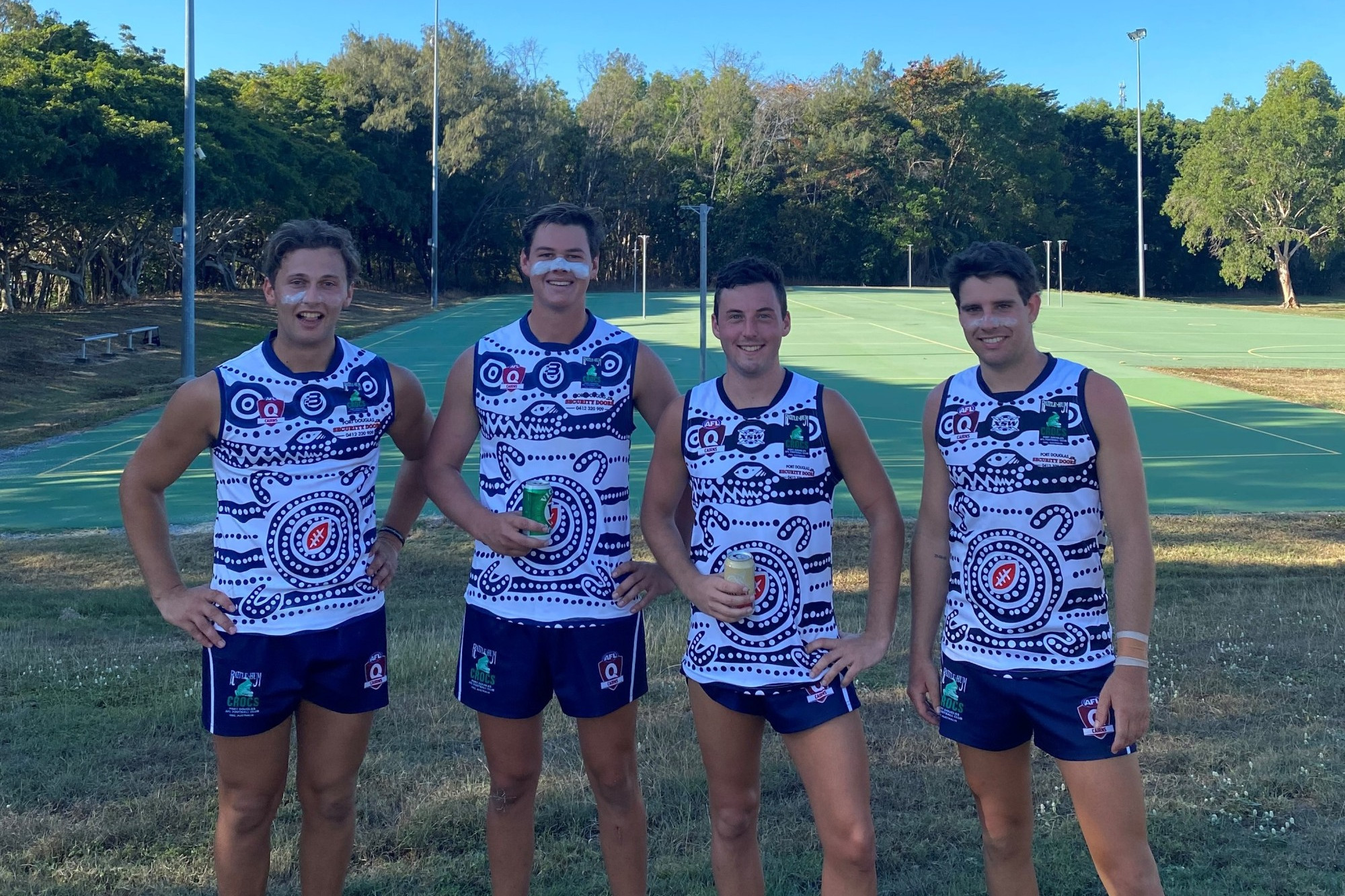 Cobden footballers Christian Koroneos (left), Josh Hickey (second from right) and Sam Giblett (right) and Alvie’s Lochie Rosevear will line-up in AFL Cairns grand finals for new club Port Douglas this weekend.