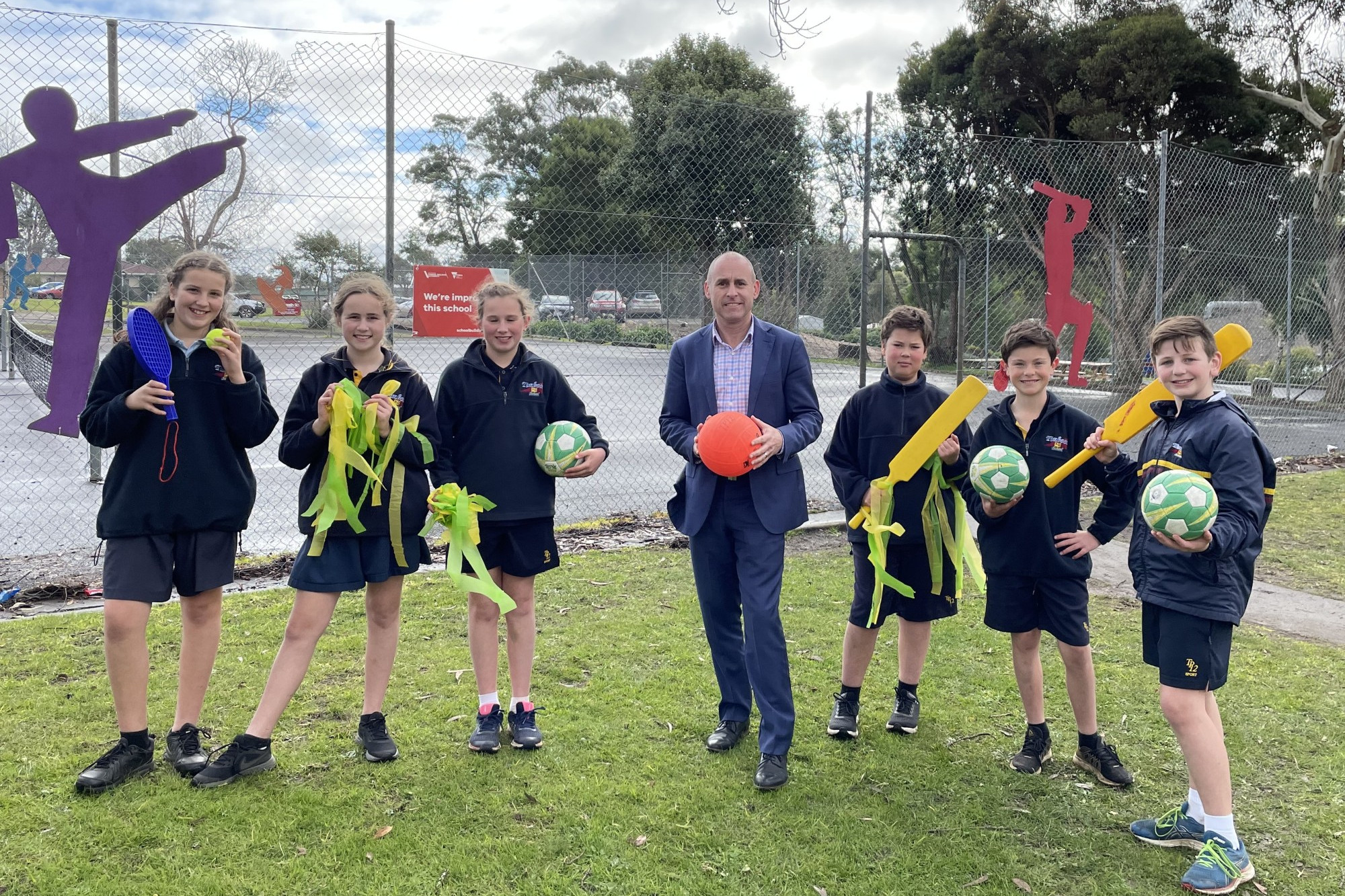 Welcome news: Timboon P-12 School principal Davin Reid, along with junior school house captains, celebrated news an architected has been appointed for the next stage of upgrades at the school.