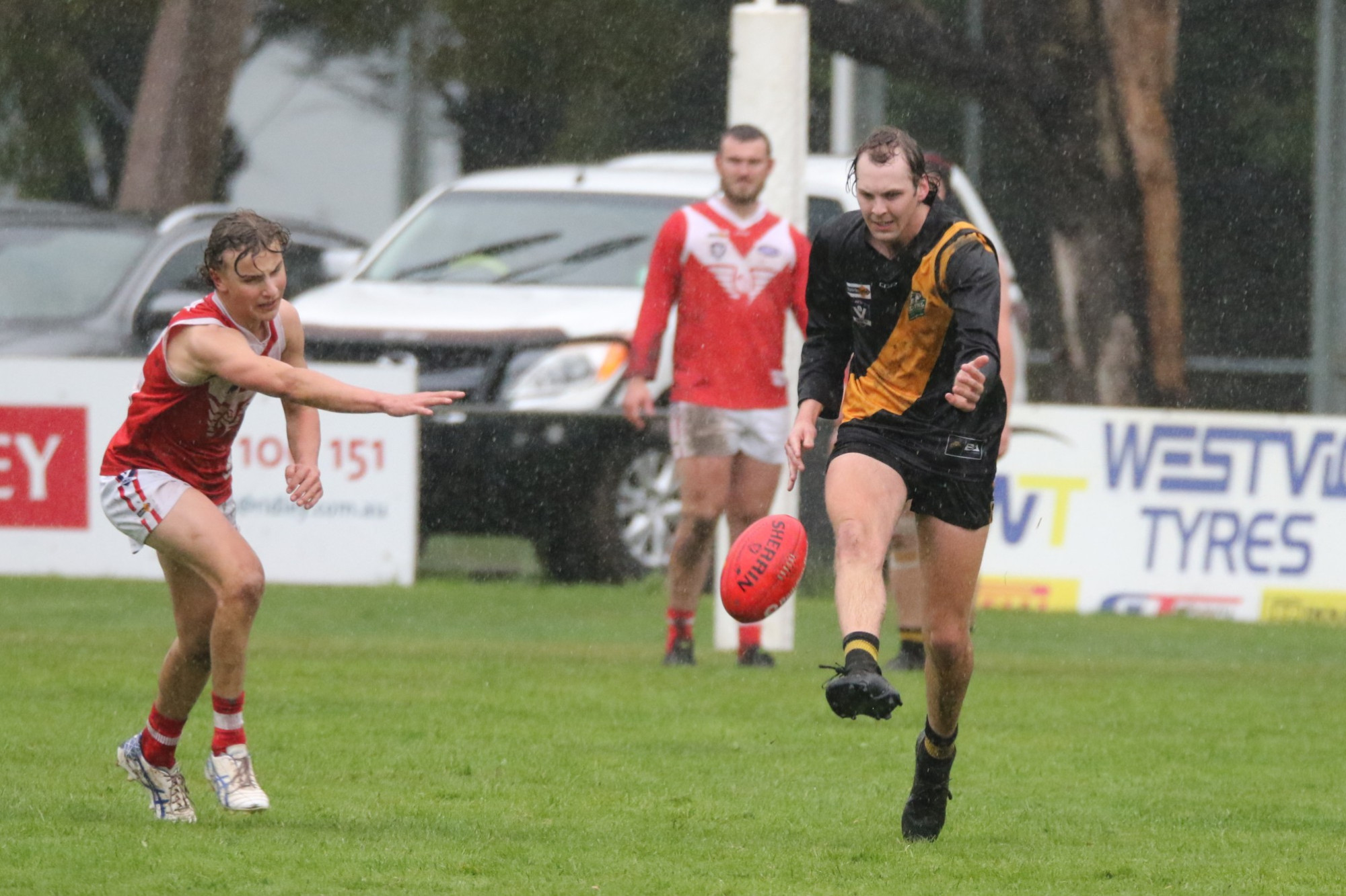 Rebound 50: Simpson’s Braden Poole kicks out of defence during the Tigers loss on Saturday.