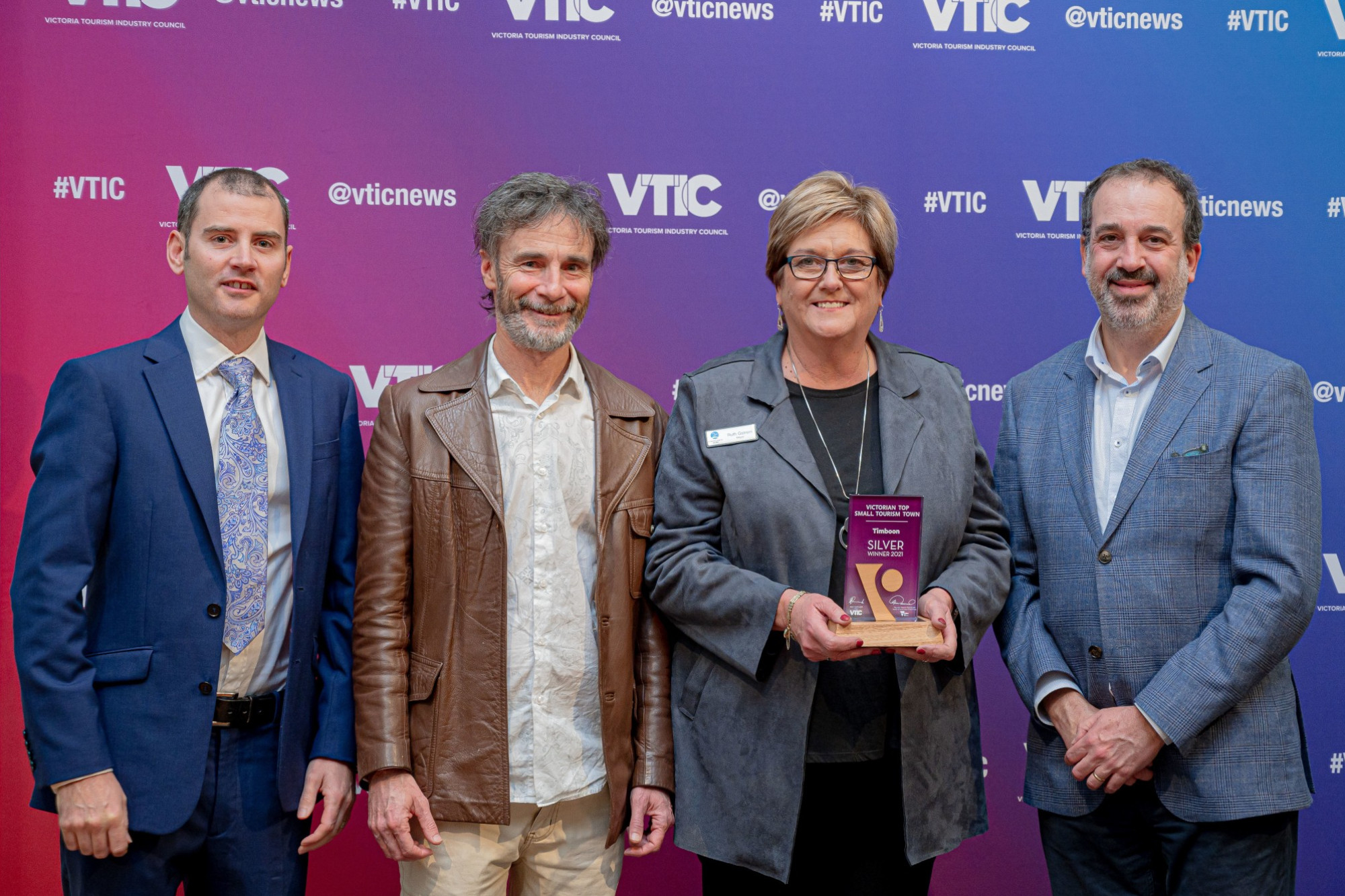 Silver award: VTIC Chair Matt McDonald, Port Campbell Visitor Information Centre co-ordinator Mark Cuthell, Corangamite Shire mayor Ruth Gstrein and Tourism Minister Martin Pakula at the Victorian Top Tourist Town Awards ceremony.