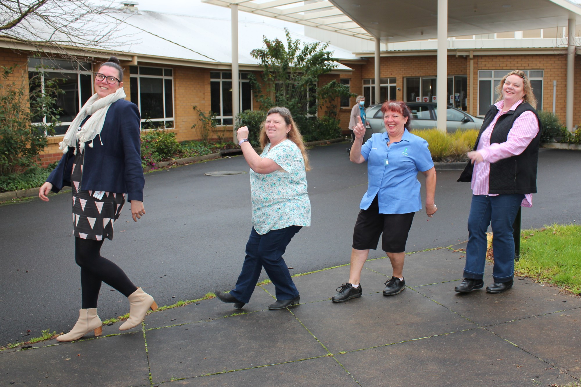 Bus draws closer: TDHS CEO Rebecca Van Wollingen gets her groove on with members of the Timboon Dance Group – Linda Pender, Lorraine Wilson and Rosie Armistead.